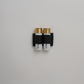 Two shotgun shells in a black dual-shell holder, photographed against a plain light gray background.